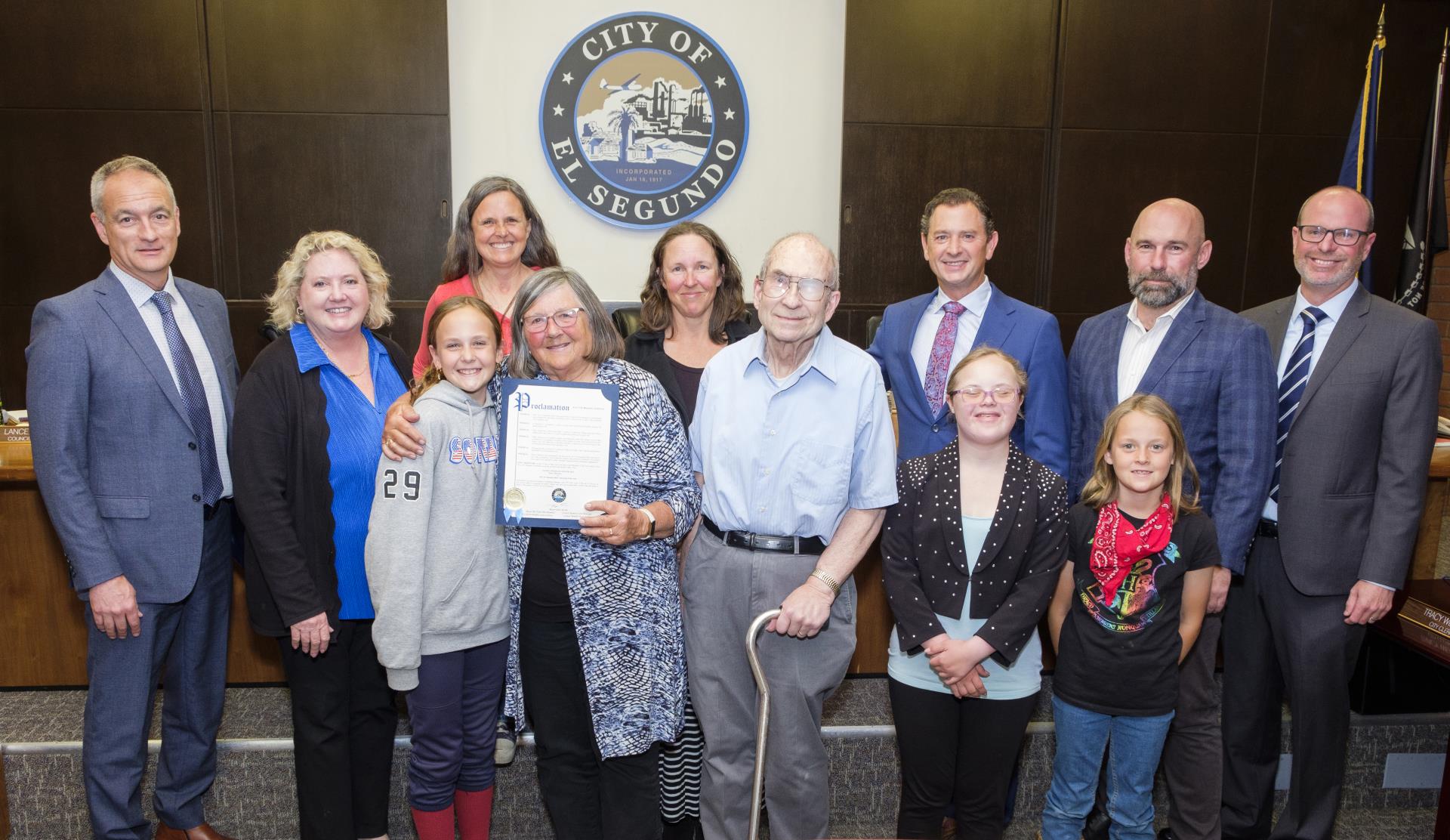 Nancy Jacobson with family and members of City Council