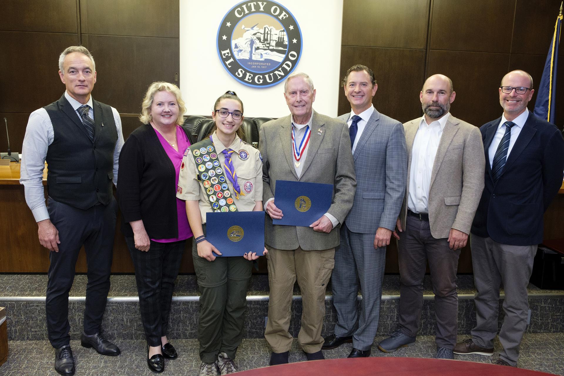 William Wenger and Ainsley Gulden accept commendation with City Council