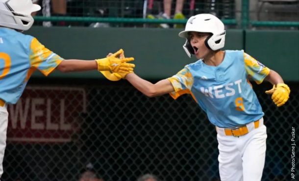 El Segundo Little League players high fiving