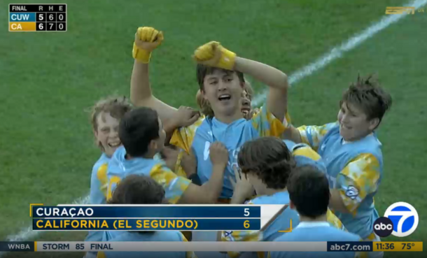 El Segundo Little League Championship Team cheering on field together after winning world series