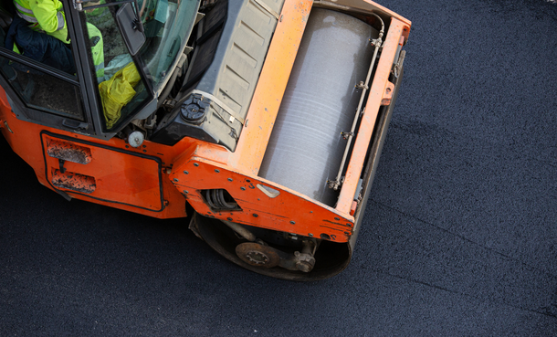 Aerial view of a paver on smooth asphalt