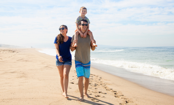 Family walking on El Segundo beach