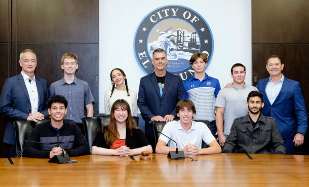 ESHS 2024 Mock City Council Winners sitting at the dais in council chambers with councilmembers