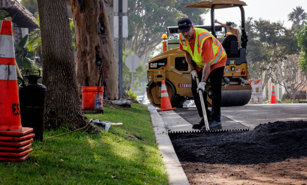 El Segundo public works engineer resurfacing a residential street