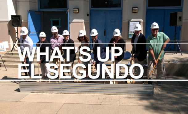 City Council, donors, and community members in hard hats breaking ground on The Plunge Renovation