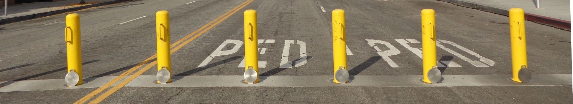 Yellow bollards on Main Street in El Segundo