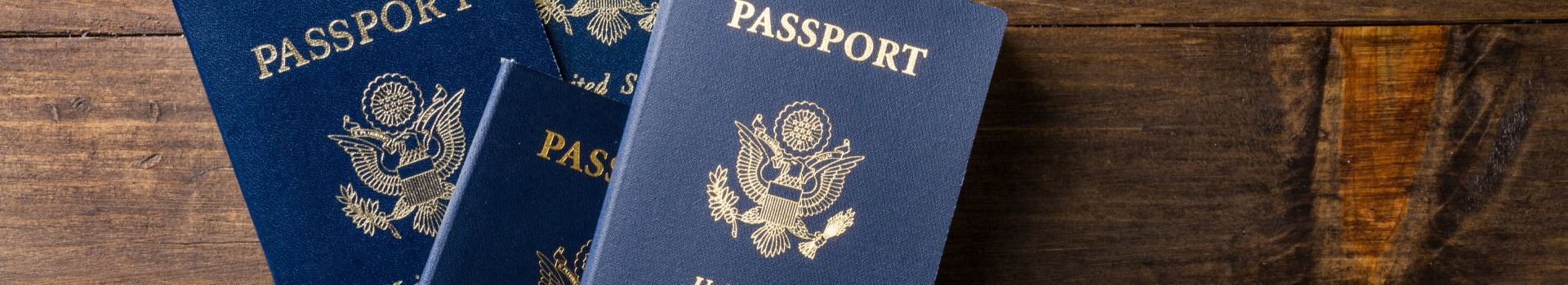 Three US passports on table